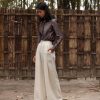 Eri Silk Easy pleated pants with cross pockets.