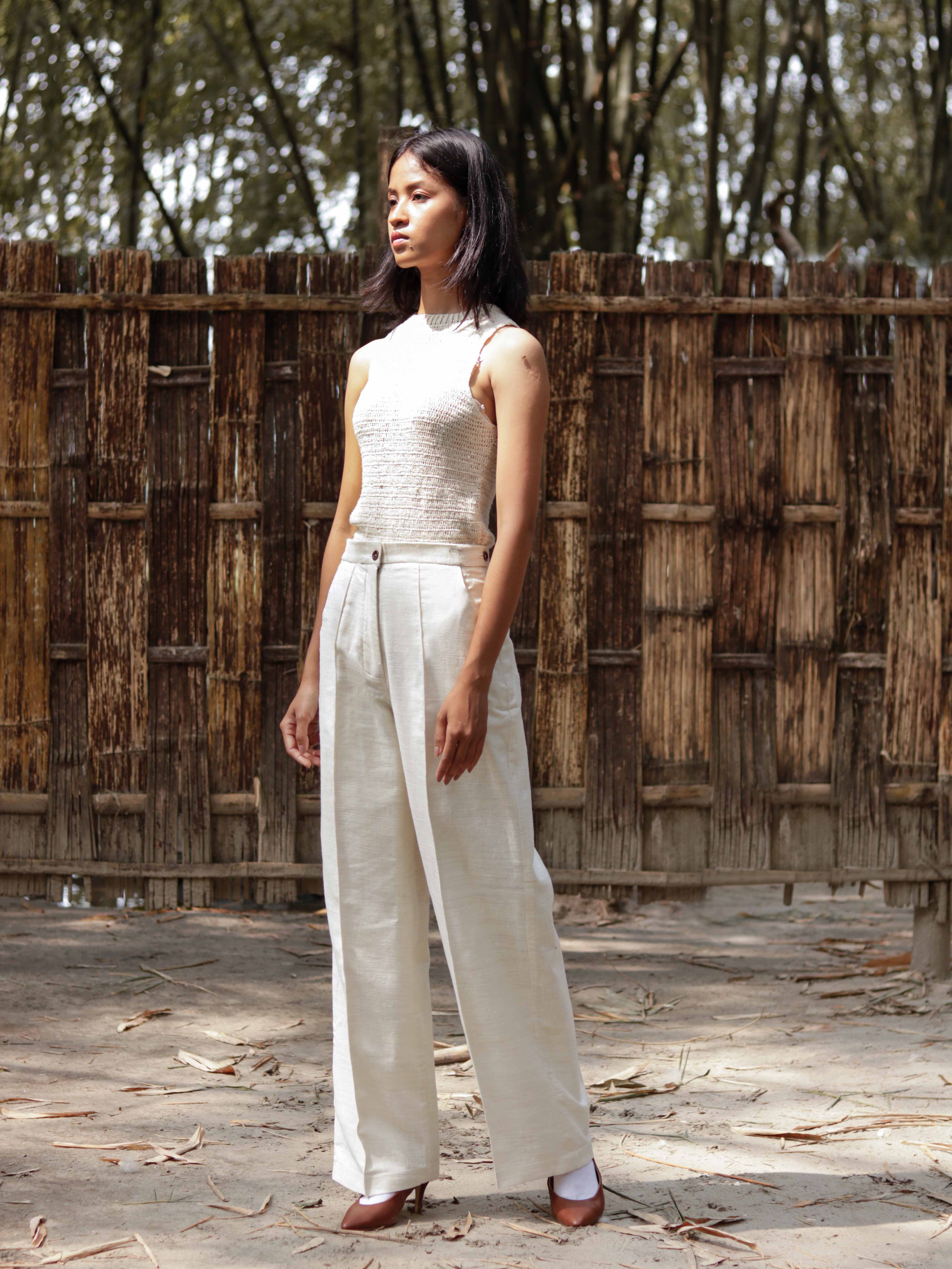 Eri Silk relaxed pants with pin-tuck at front crease line.